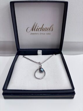 Michaels Silver Teardrop Necklace with Iridescent Blue Accent
